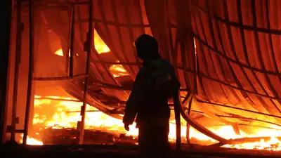 Black smoke billowed over Petropavlovsk as a stadium caught fire.